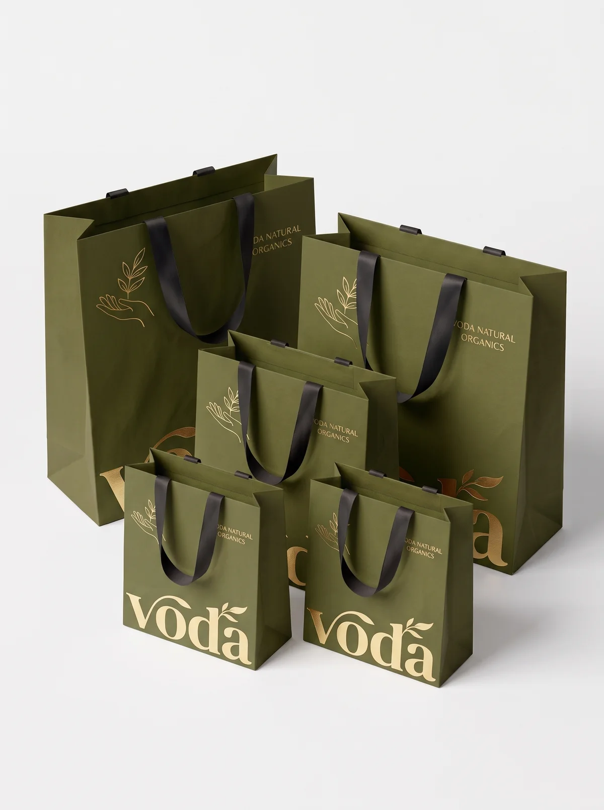 Shopping Bags — Paper bags with the structure, handles and finish of a luxury purchase.
