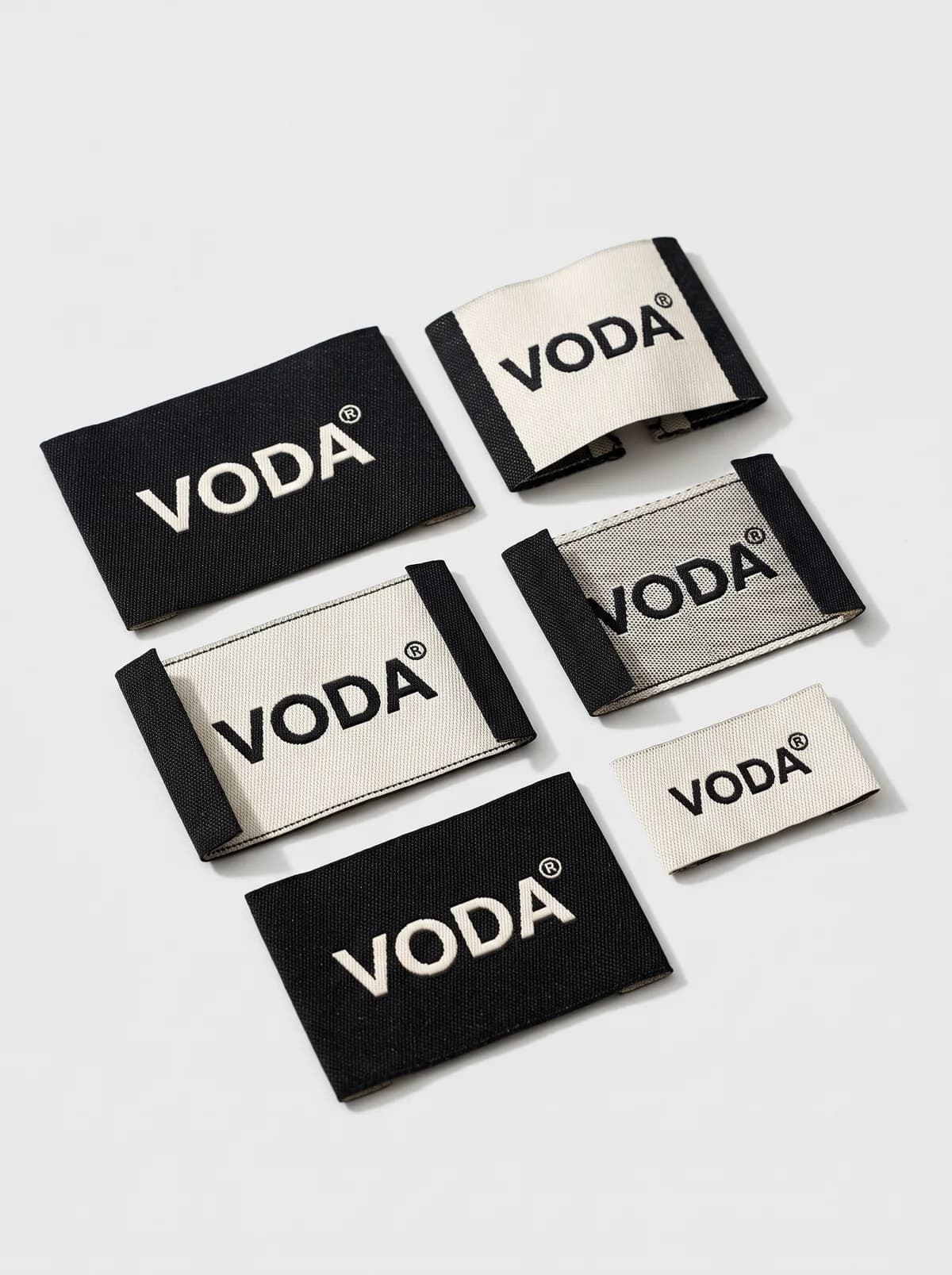 Woven Labels — Fine-thread woven labels with crisp lettering and soft edges.